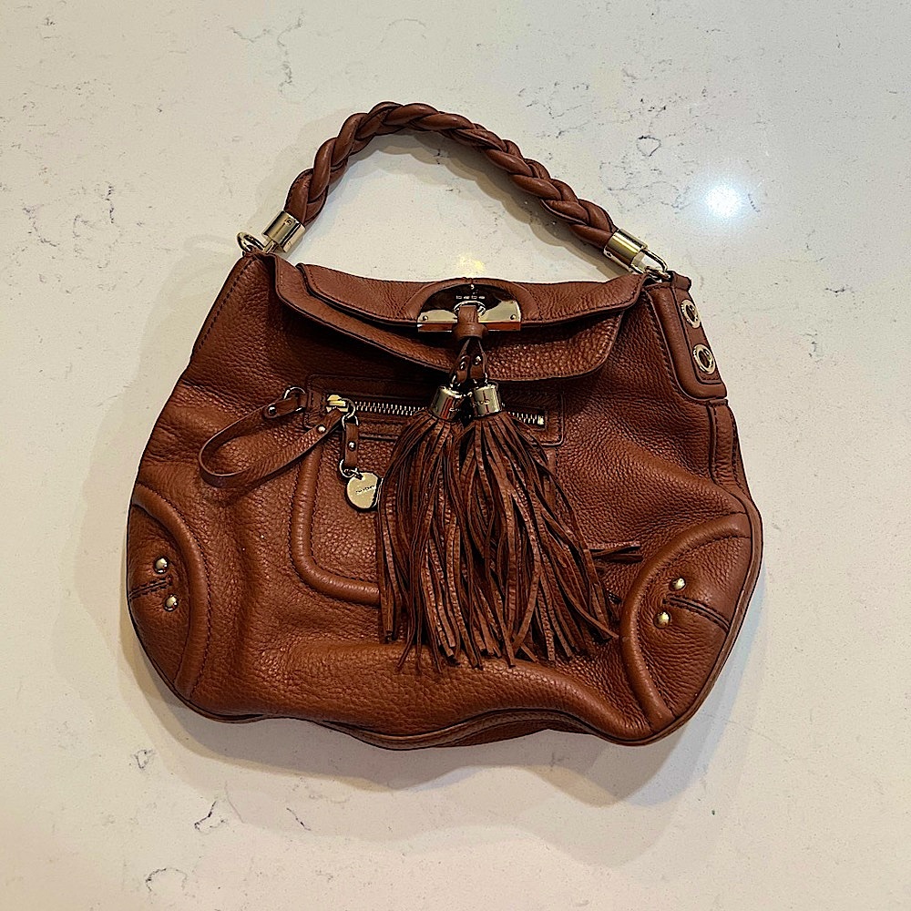 Bebe brown leather hobo purse.